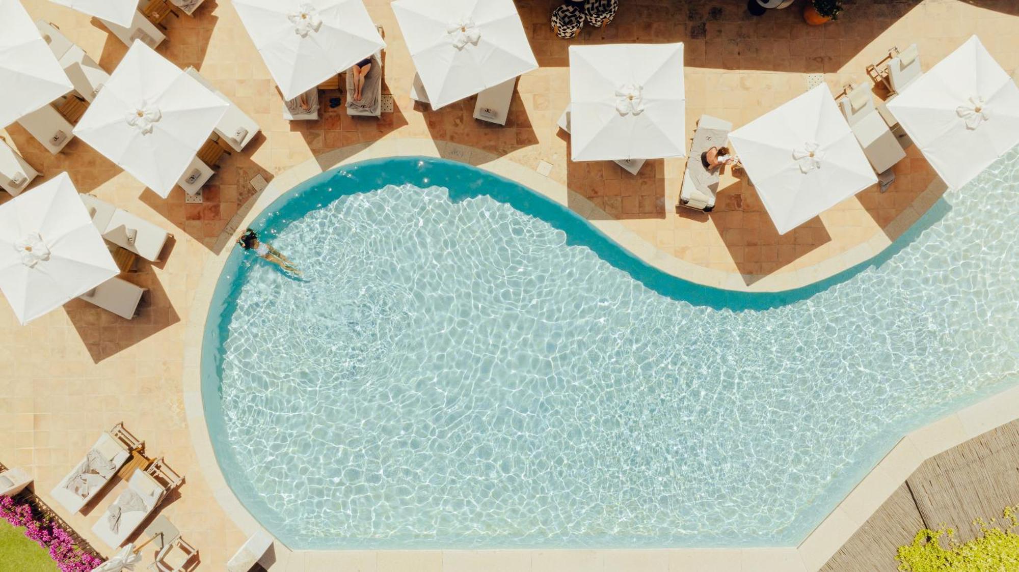 Aethos Sardinia Hotel Cannigione Exterior photo