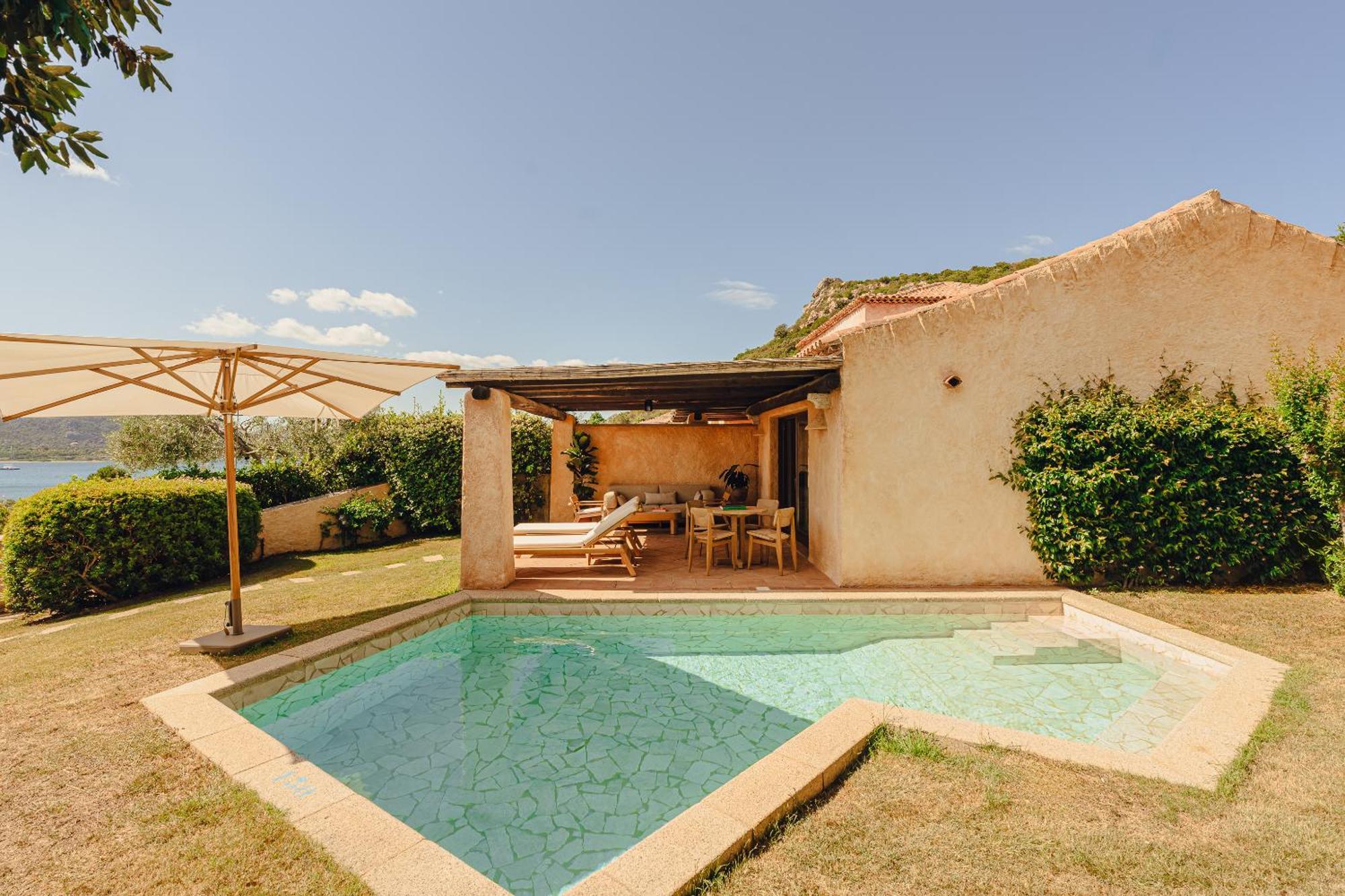 Aethos Sardinia Hotel Cannigione Exterior photo